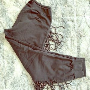 Kittenish fringe sweats